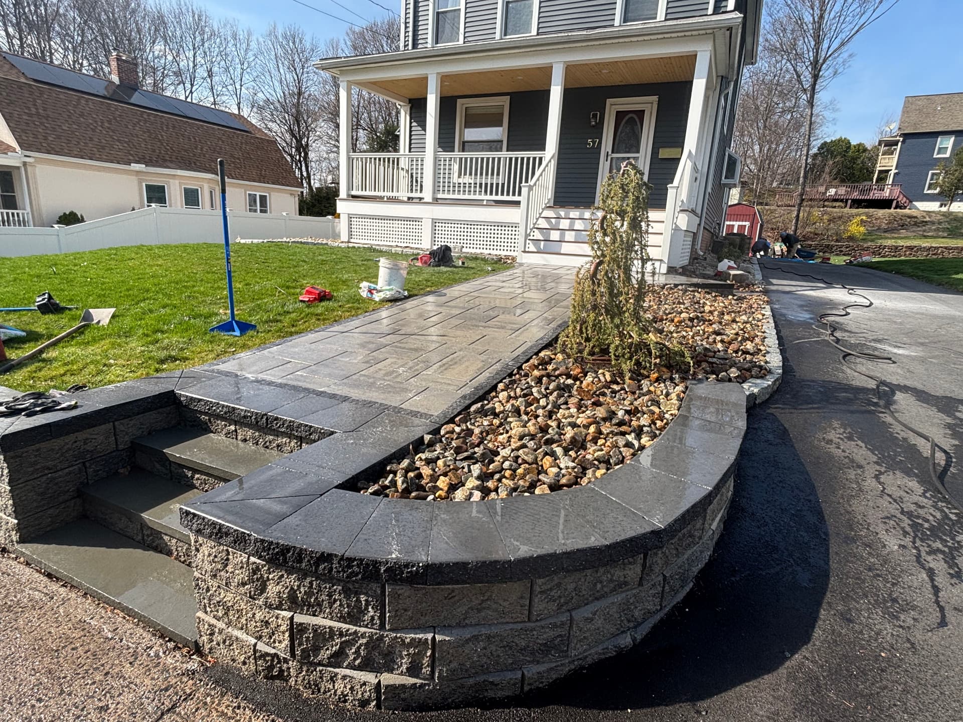 Front Yard Hardscape Rebuild With Paver Walkway and Retaining Wall